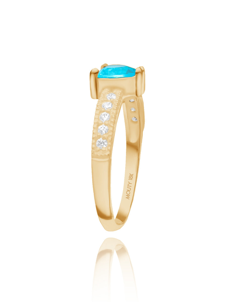 Anillo Fanny en oro amarillo 18k con circonia azul cielo