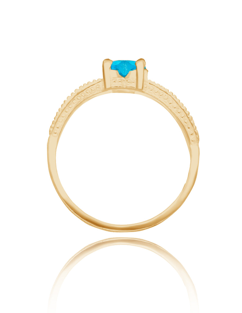 Anillo Fanny en oro amarillo 18k con circonia azul cielo