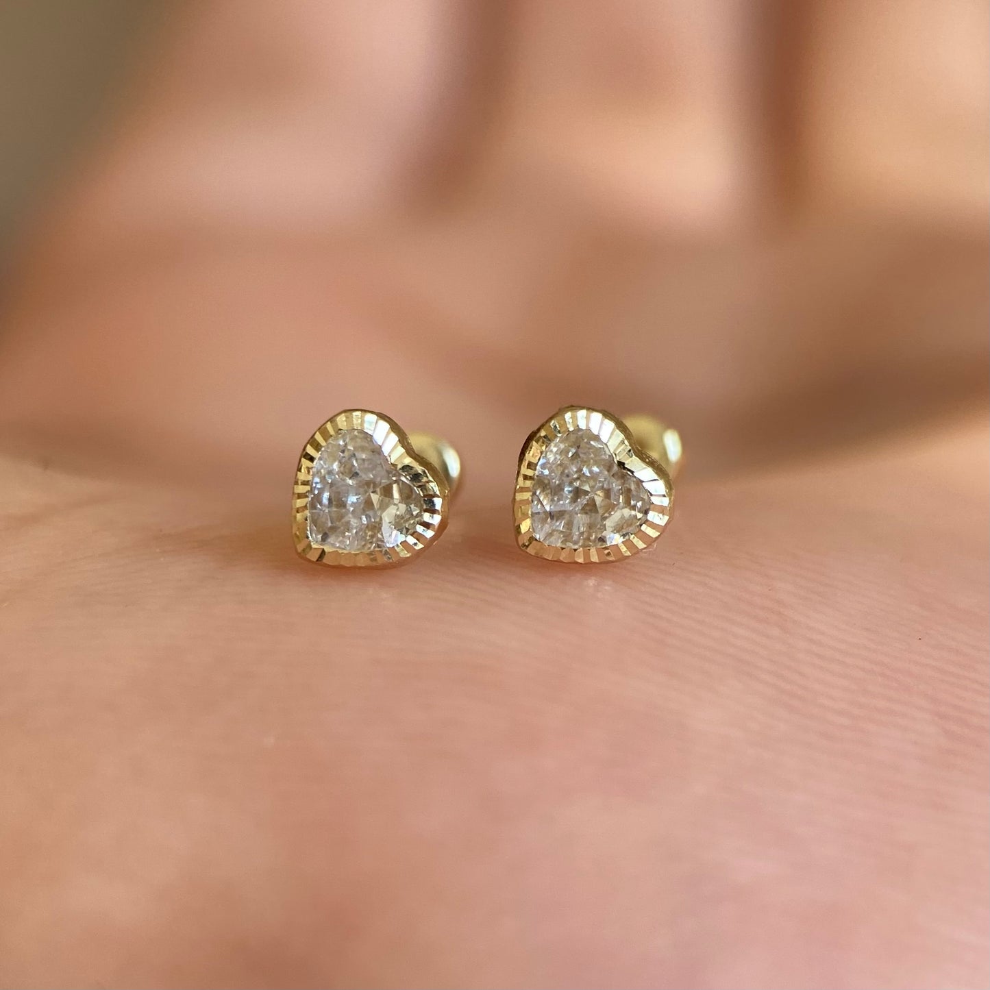 Straight heart studs with 4x4 diamond bezel in 14k yellow gold with zirconia Code: 14307